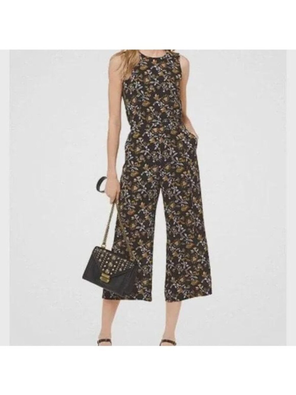 Michael Kors Sleeveless Black Floral capri jumpsuit size 0 PTP 16 length 48.5